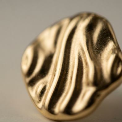 Gold Wave Textured Disc Studs Detail view