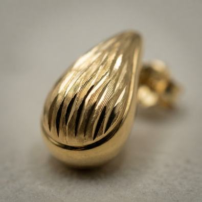 Gold Flame Textured Teardrop Studs Detail view